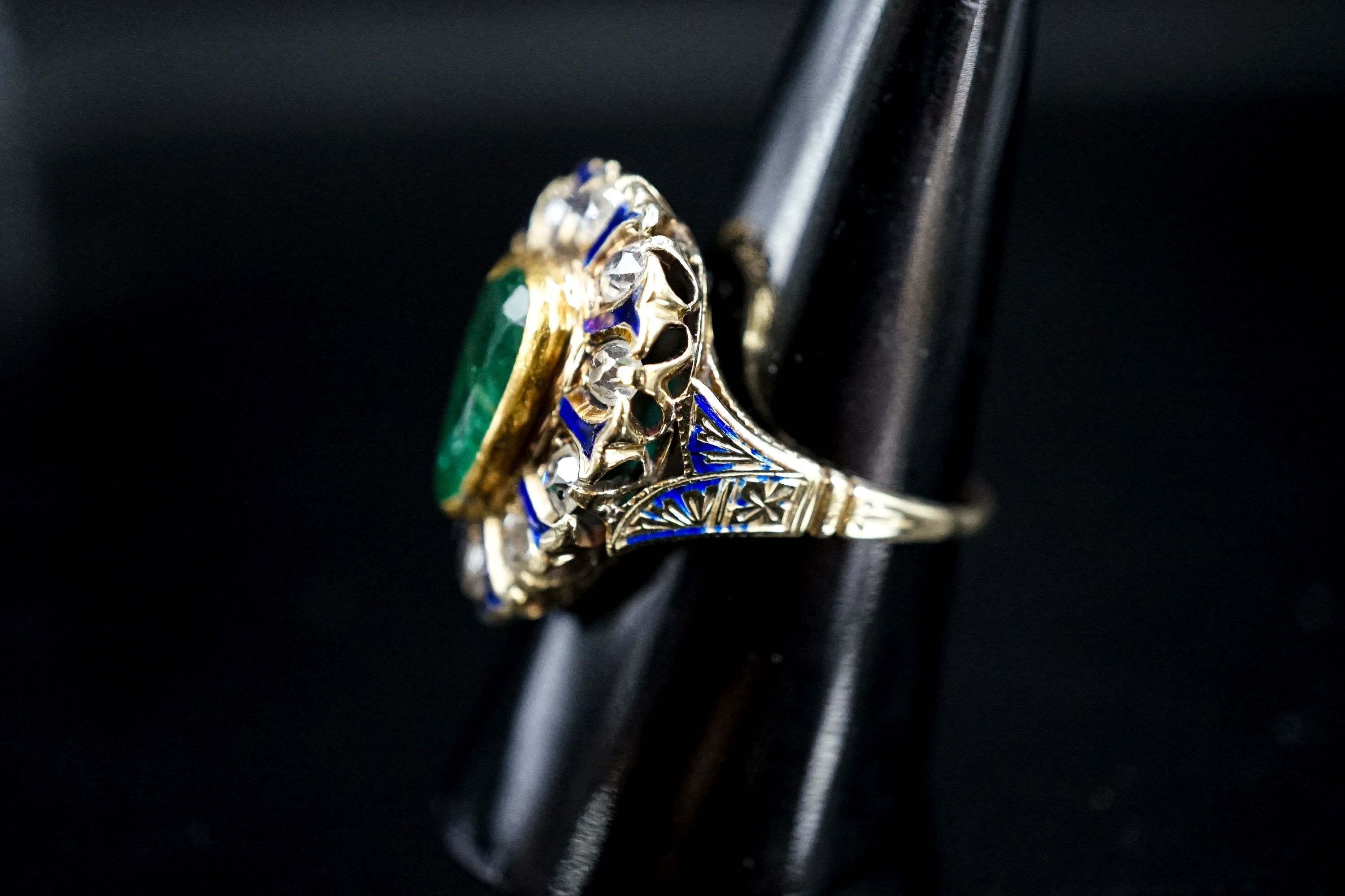 A 14k, emerald, diamond and enamel set pear shaped cluster ring, size Q, gross weight 8.3 grams.